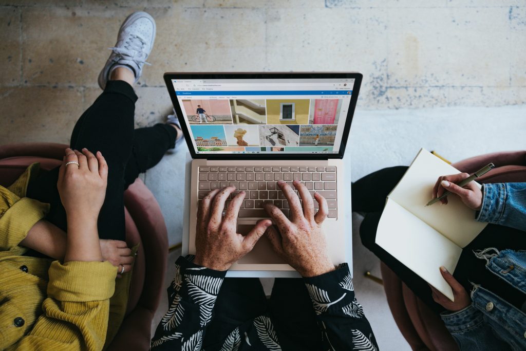 A freelance business person on a computer developing a plan